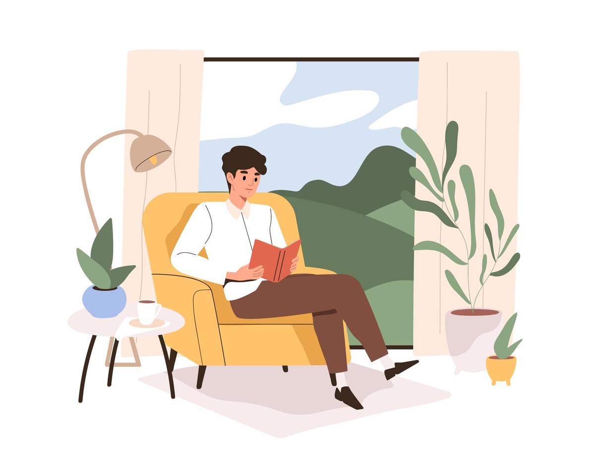 A boy sitting on a sofa and reading